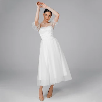 Poročne Obleke Bele Pike Til O Vratu Puff Rokavi Kratka Poročne Obleke za Ženske 2023 Nevesta Linije Čaj Dolžina Dvorani Poročne obleke
